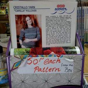 A box of knitting patterns labelled 50P each from box, in Art and Craft Valley