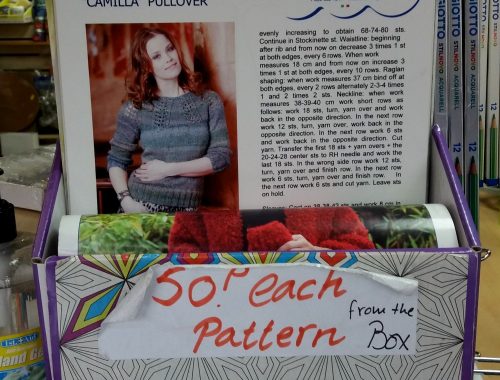 A box of knitting patterns labelled 50P each from box, in Art and Craft Valley